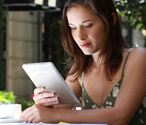 Woman with Amazon Kindle 2