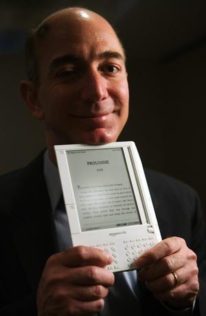 jeff-bezos-with-kindle