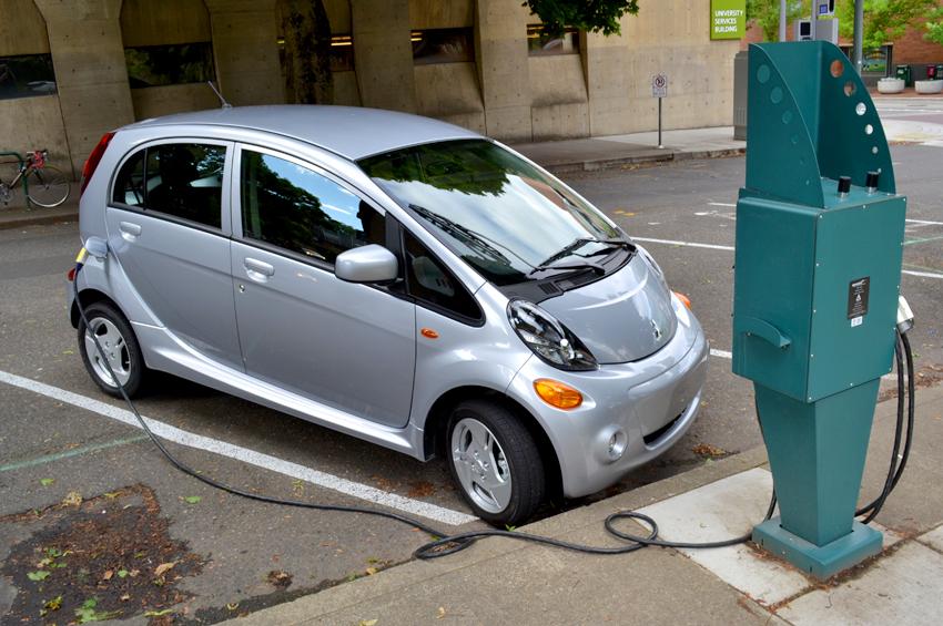 Mitsubishi i MiEV review exterior front left plugged in electric vehicle