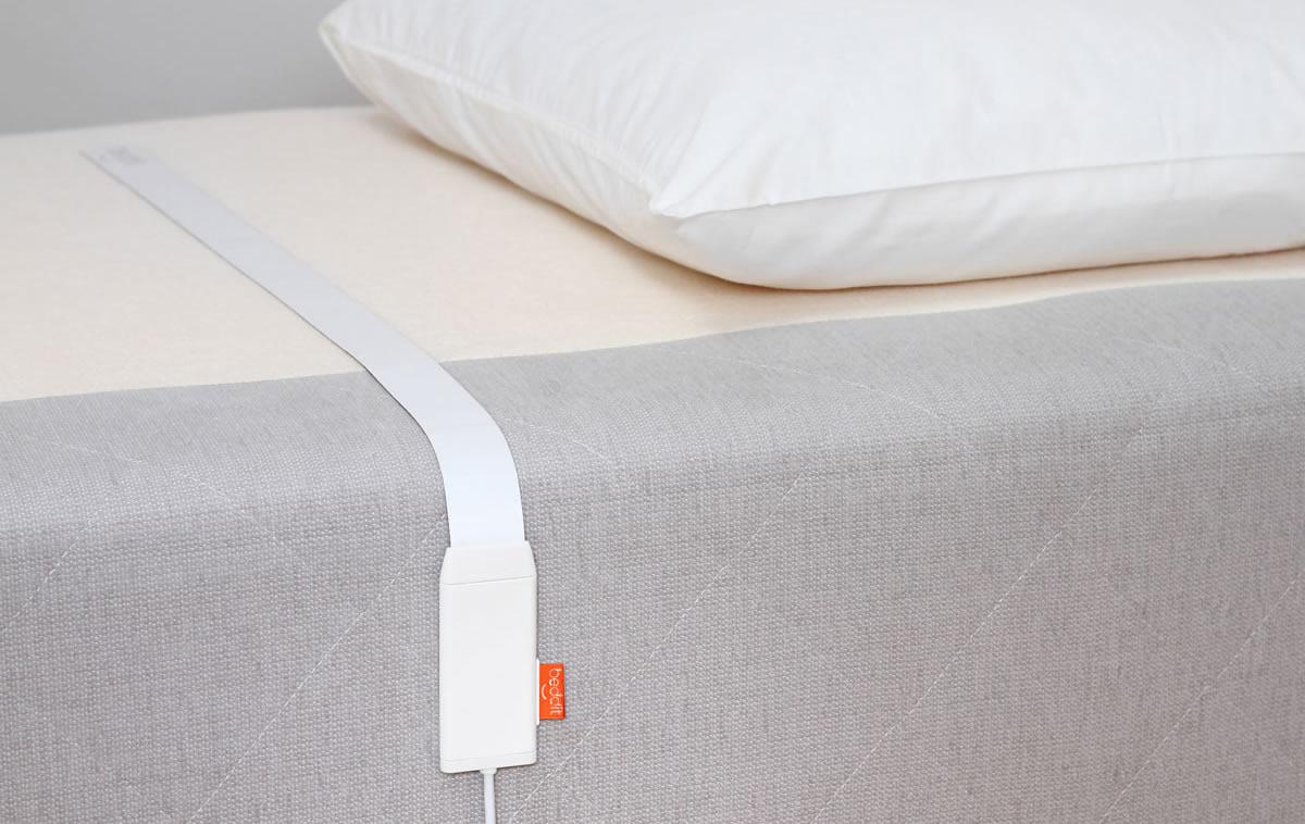 beddit tracker monitors your sleep without having to wear it white sensor on bed