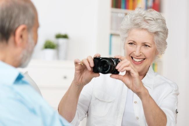 put crosswords pick camera study shows photography improves memory lady with