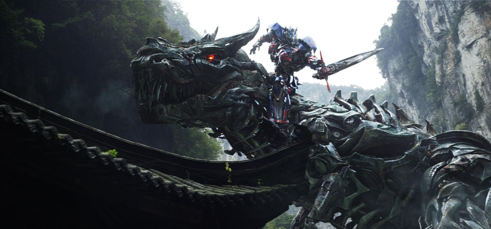 transformers age extinction trailer brings dinobot action megatrons gun face of grimlock