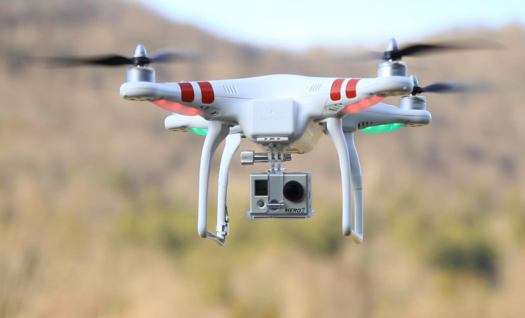 gopro developing consumer drones for 2015 launch report says dji phantom with hero hd2