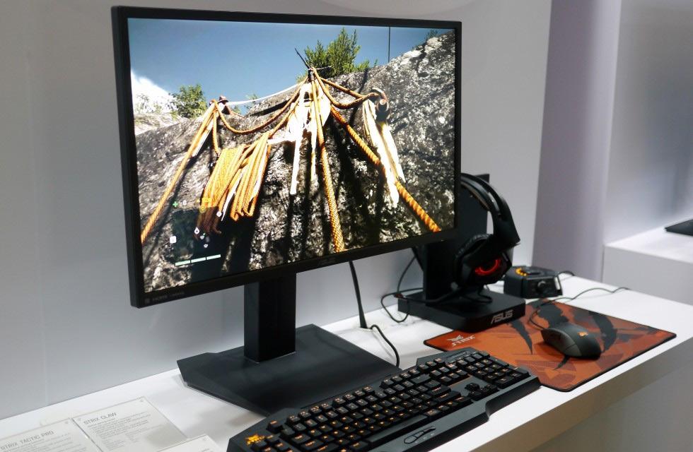 A gaming monitor sitting on a desk.