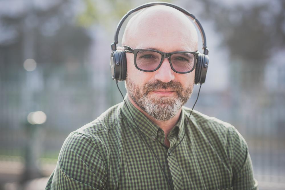 people stop listening to new music after age 33 middle aged man