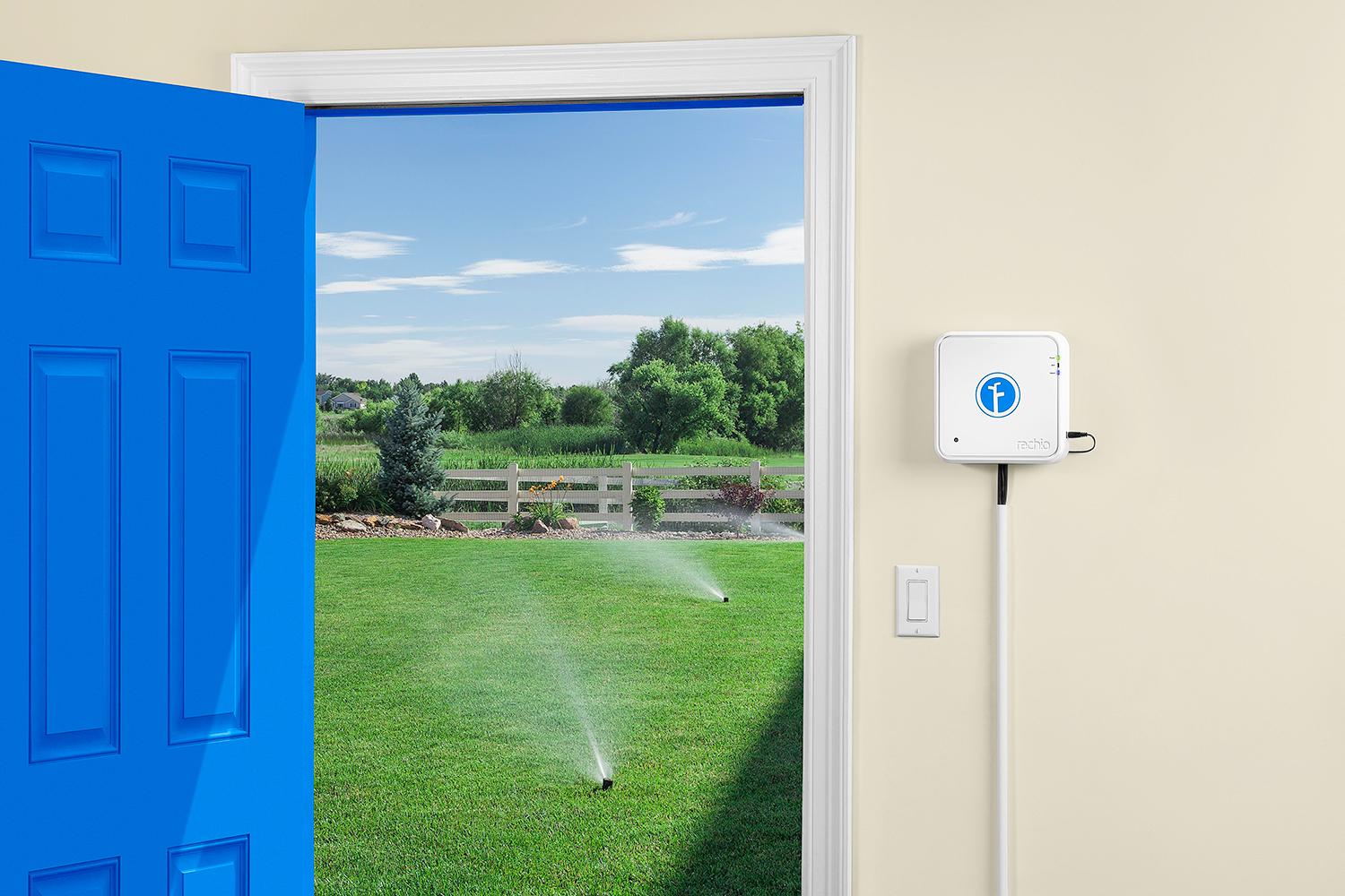 Rachio IRO smart sprinkler installed on wall.