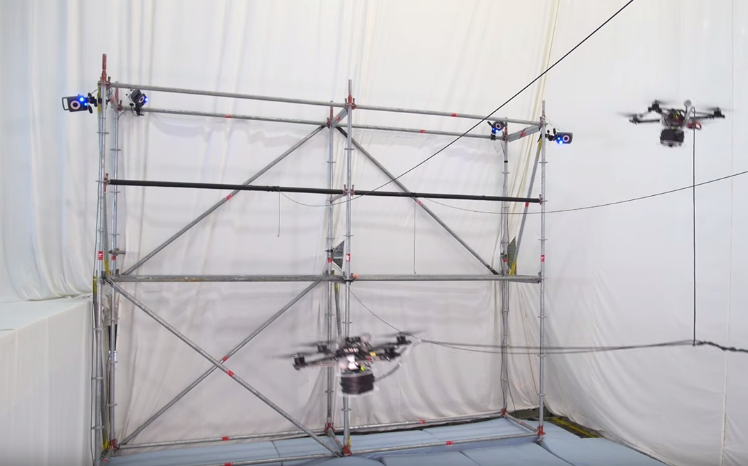 watch these drones build a rope bridge that can support human screen shot 2015 09 21 at 9 31 27 am