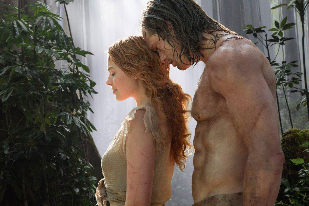 A man stands next to a woman in The Legend of Tarzan.