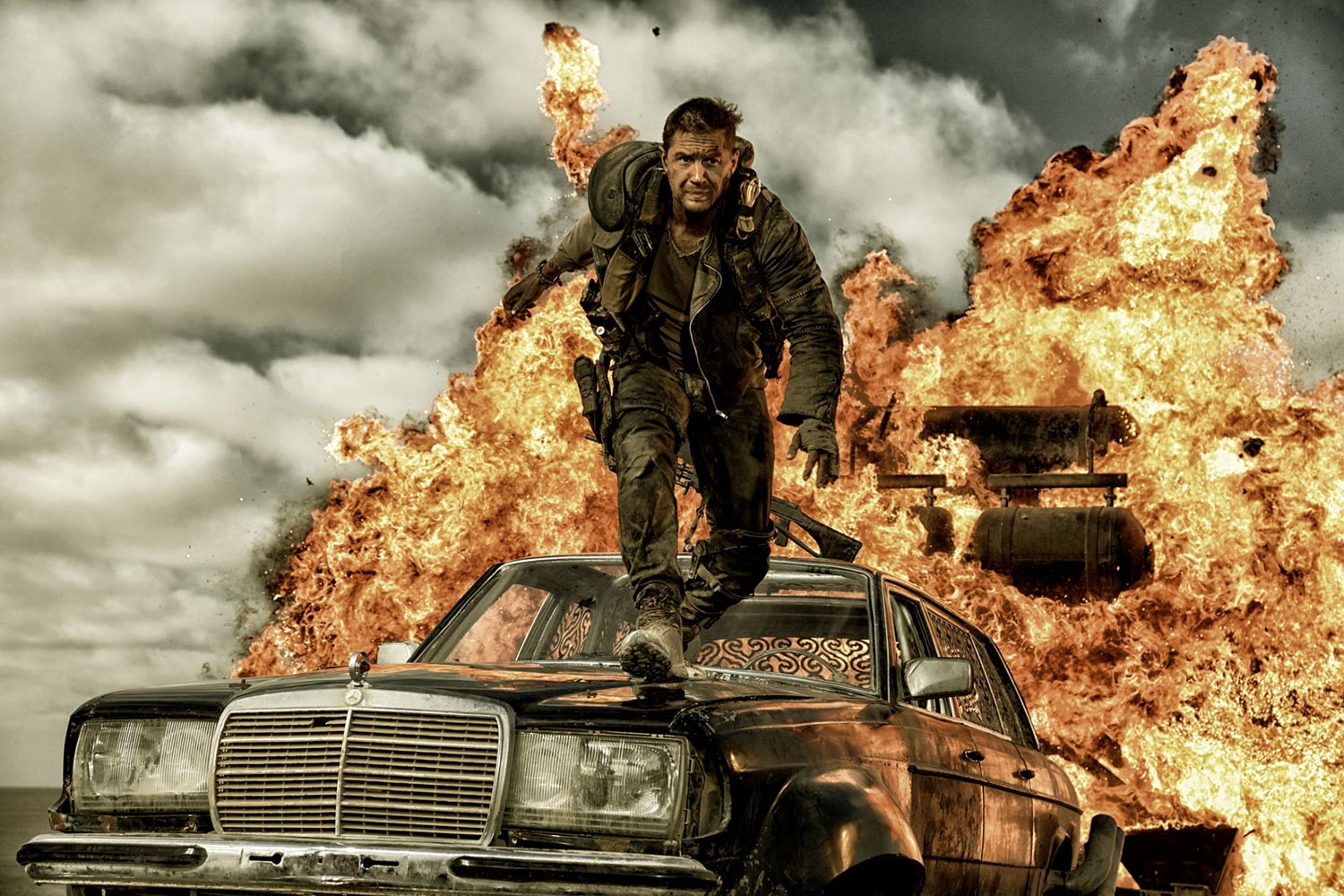 Max jumps from a car in Mad Max: Fury Road.