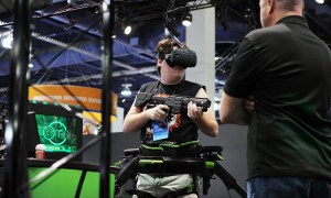 virtual reality and exclusivity palmer luckey playing with virtuix omni