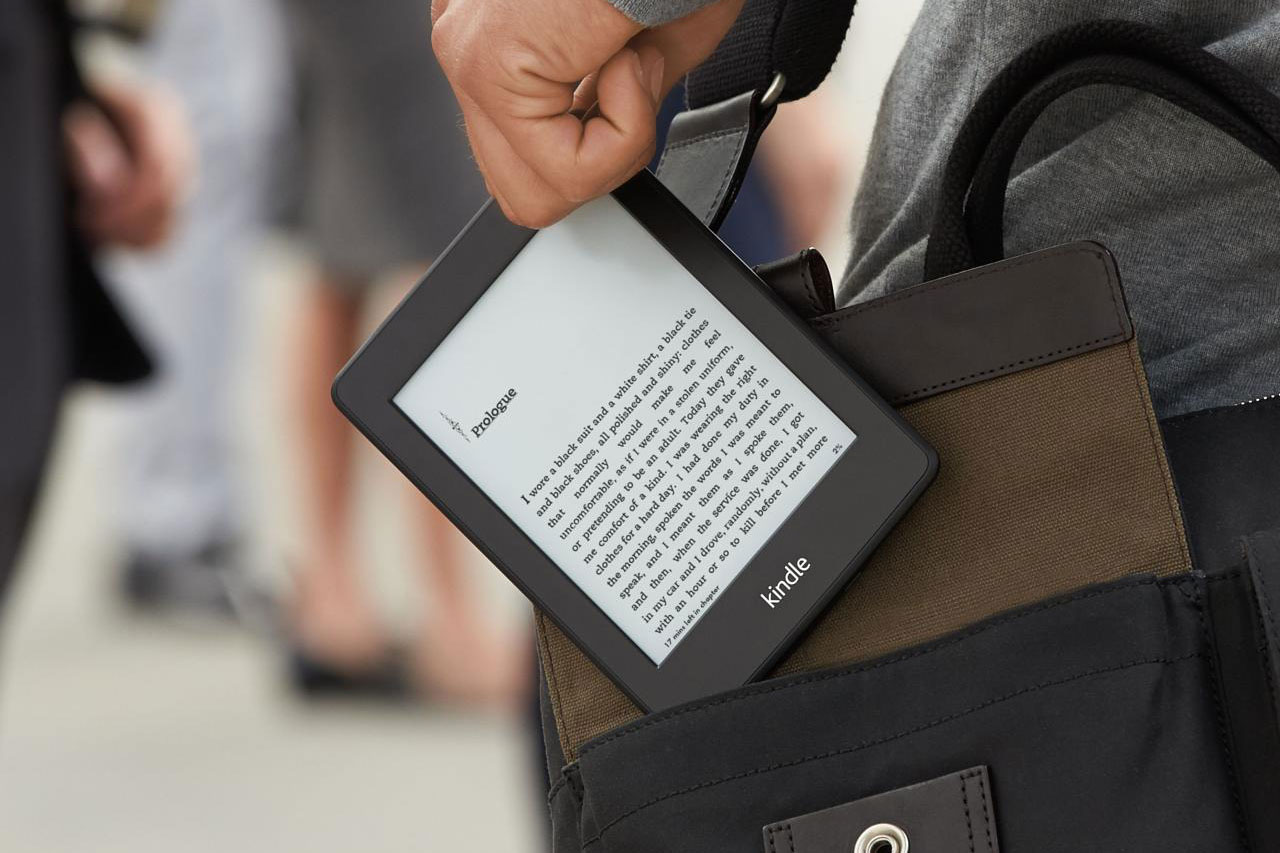 amazon kindle held in hand