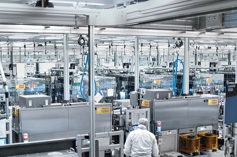 Workers inside an Intel foundry