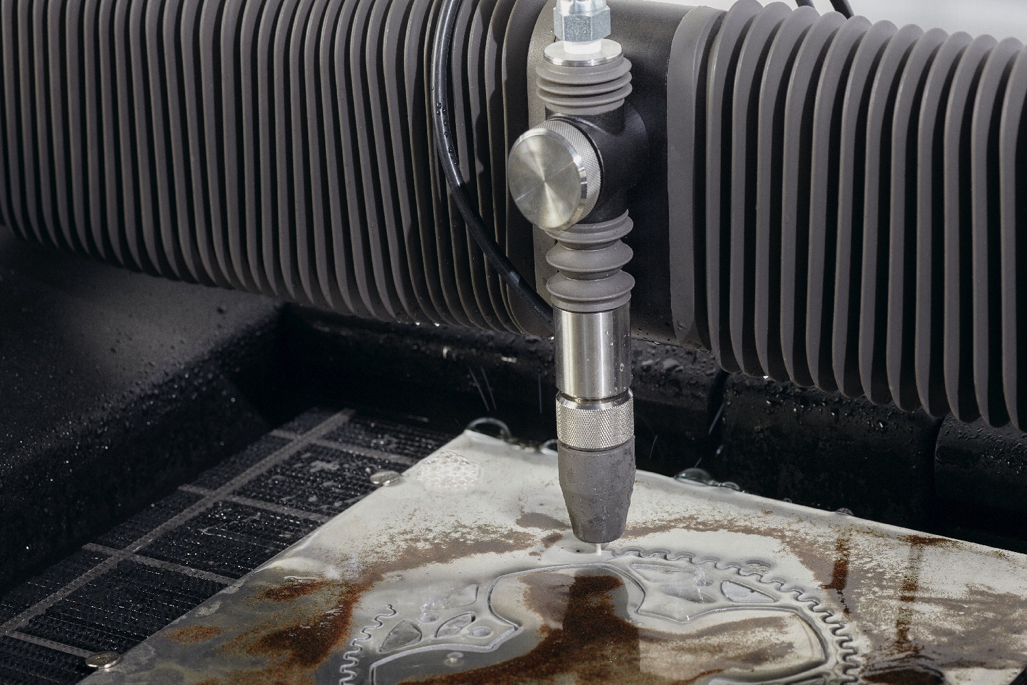 wazer waterjet cutter kickstarter closeup cutting sprocket