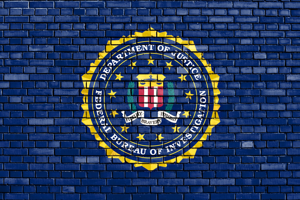 fbi warning internet connected toys 50106167  flag of painted on brick wall