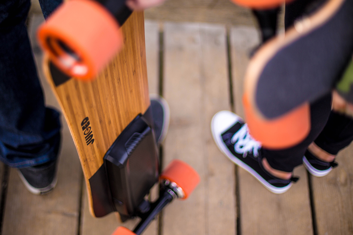 juiced electric skateboard juicedboard standing