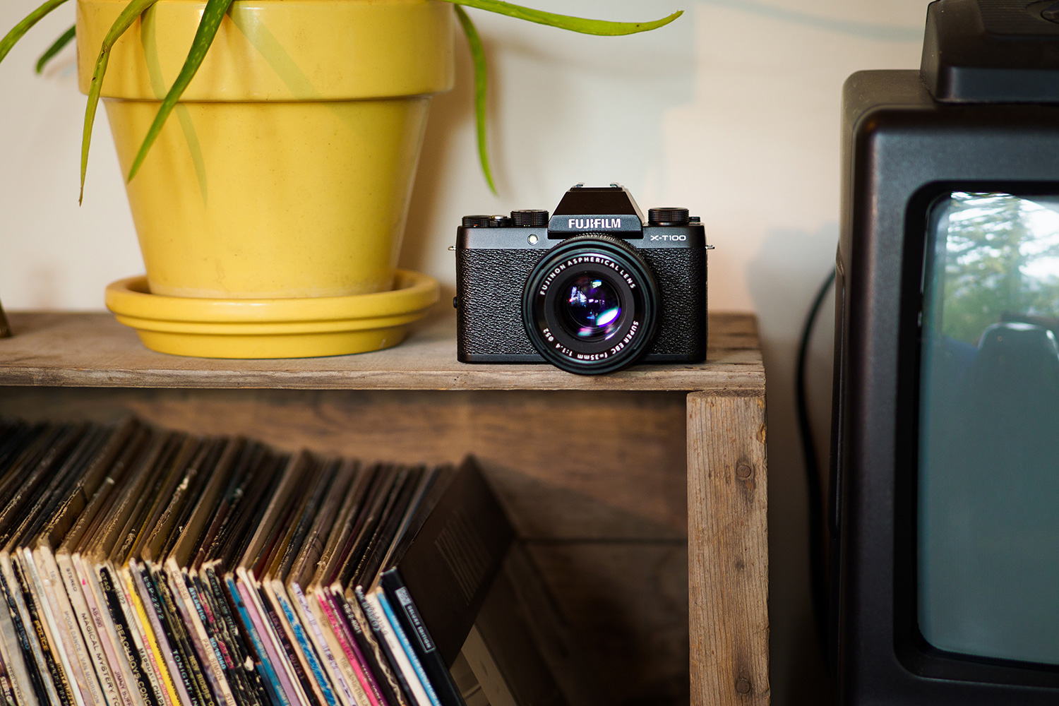 fujifilm x-t100 on shelf