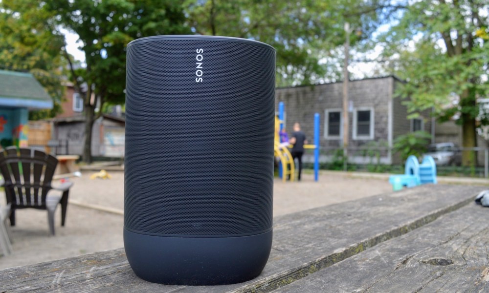 Sonos Move outdoors on a picnic bench.