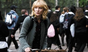 A woman rides a bike in Notes on a Scandal.