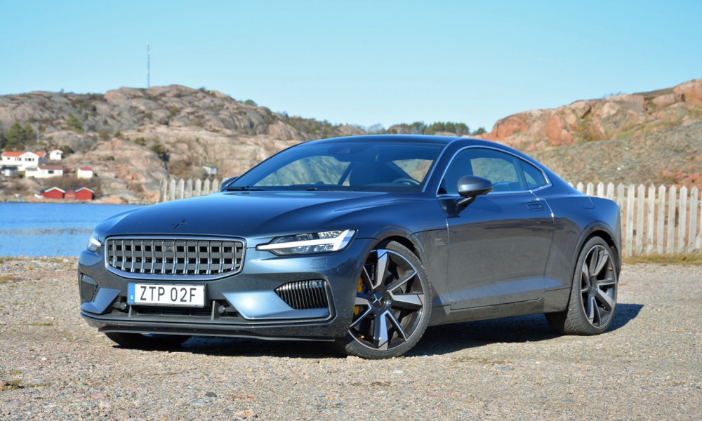 A 2020 Polestar 1 parked near a body of water.