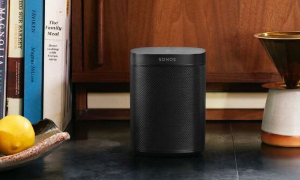 The Sonos One smart speaker on a countertop.