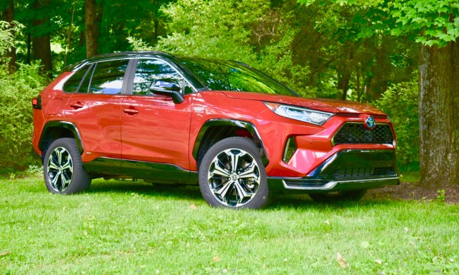 A 2021 Toyota RAV4 Prime in a park-like setting.