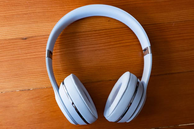 The Beats Solo3 wireless headphones on top of a table.