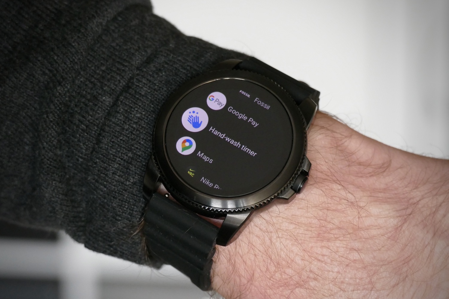 Someone wearing a Fossil Gen 5e smartwatch.