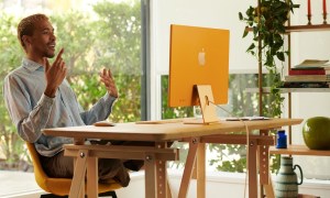 Man in front of iMac.