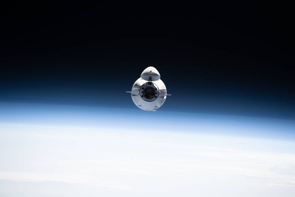 The SpaceX Cargo Dragon resupply ship is pictured approaching the International Space Station June 5, 2021, carrying over 7,300 pounds of new science, supplies and solar arrays to replenish the Expedition 65 crew.