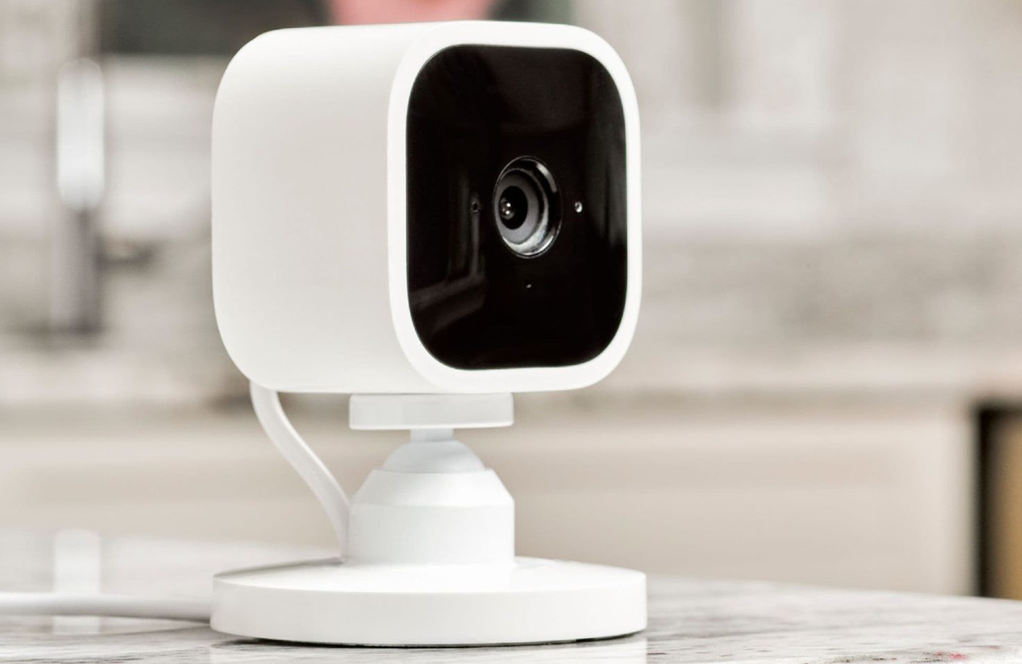 blink mini vs arlo essential indoor cam corded 1080p security camera