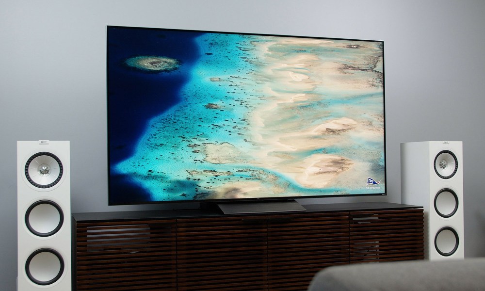 Island/Beach imagery on the TCL 6-Series model R648 screen.