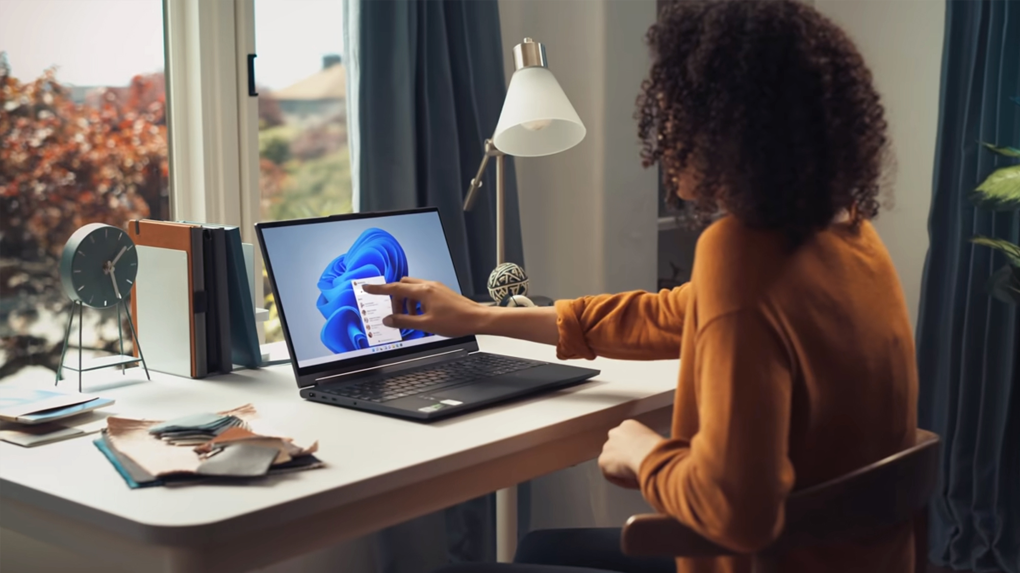 windows 11 fixes update process in one important way woman on laptop lifestyle