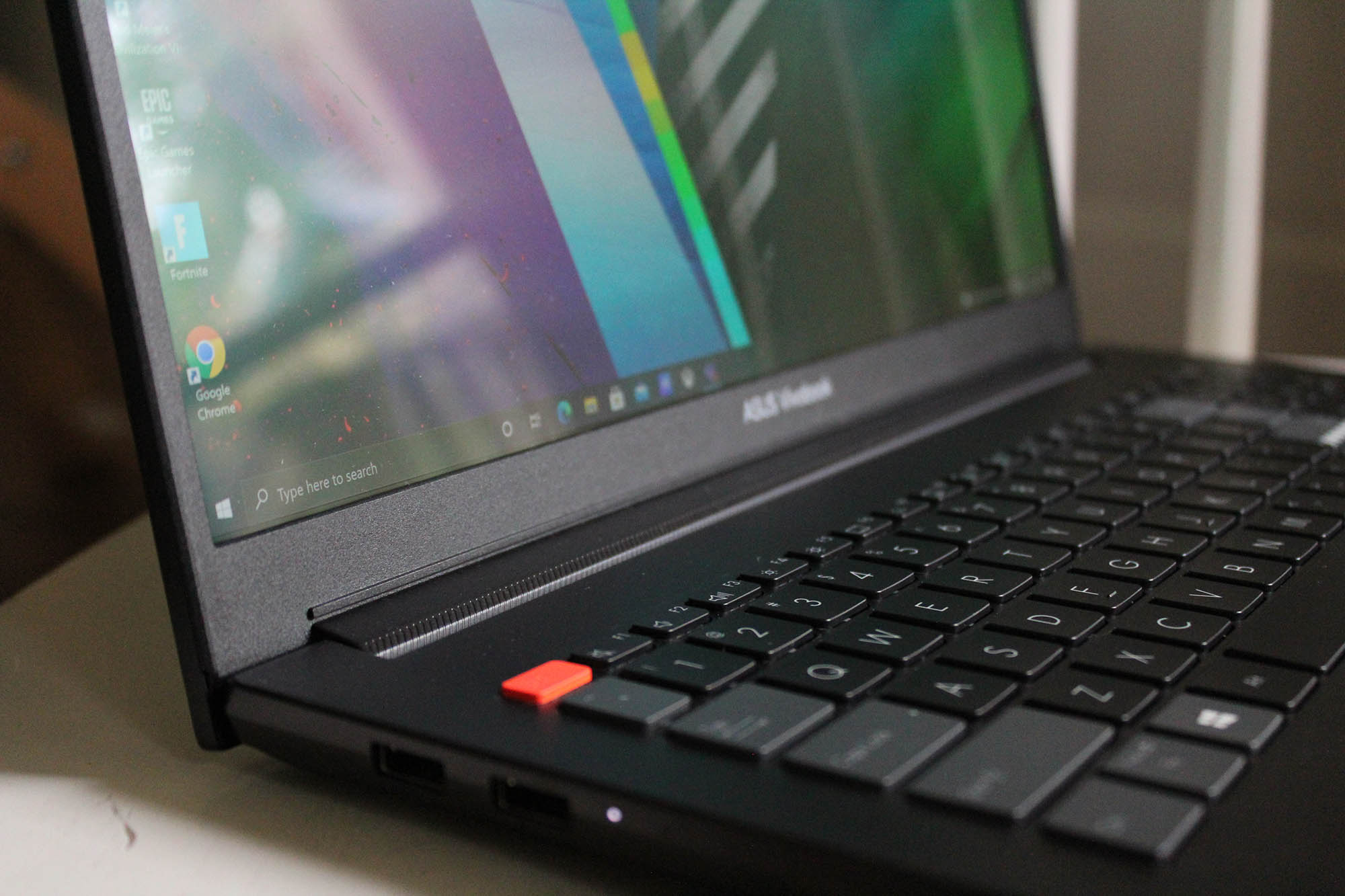 Orange keycap on the Asus Vivobook Pro 16X OLED keyboard.