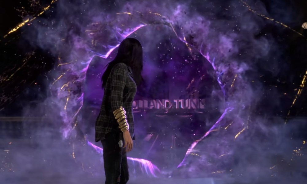 Main character looking through a portal in Forspoken.