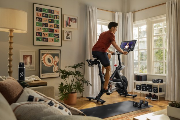 A man riding a Peloton bike.