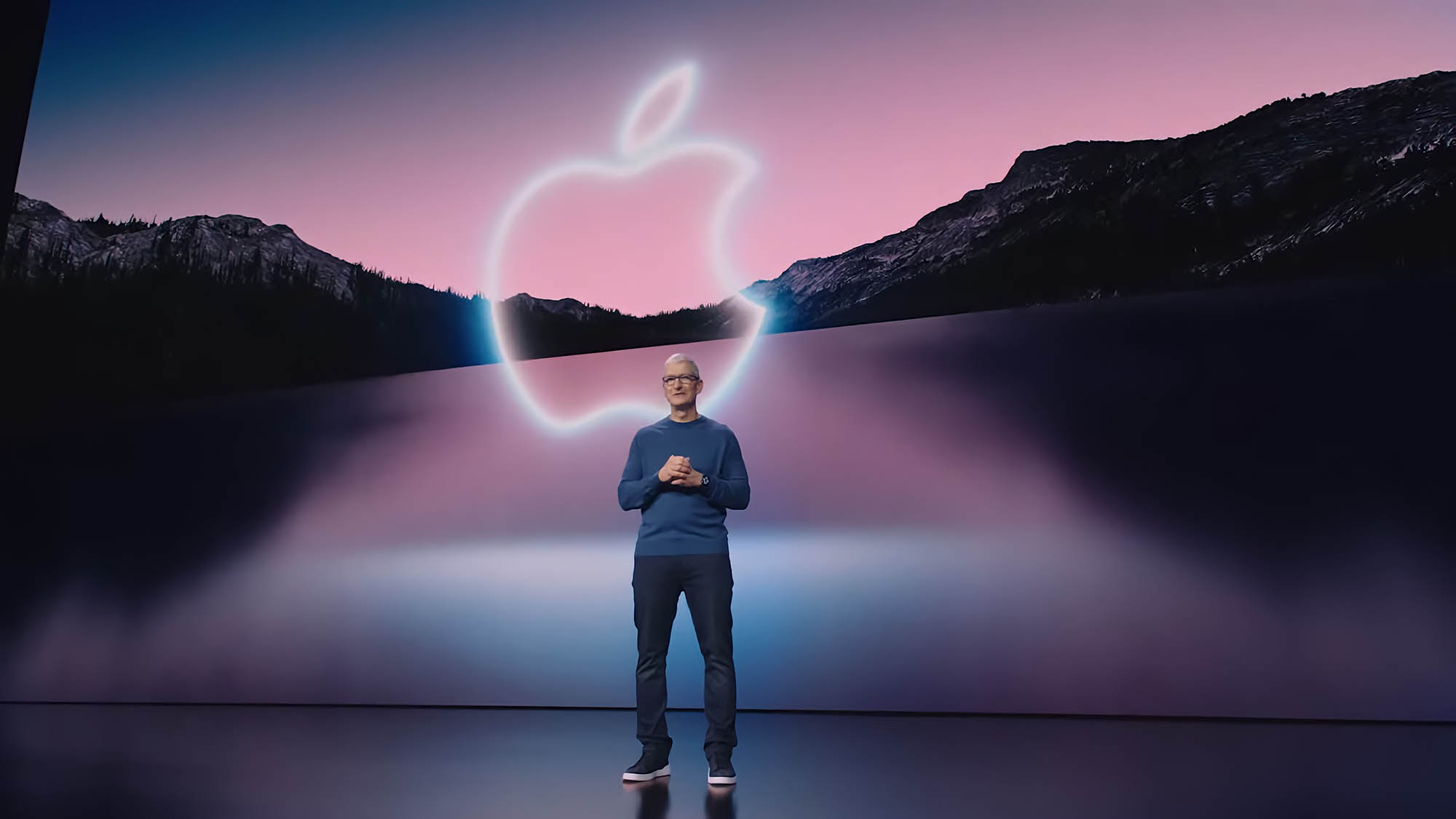 Apple CEO, Tim Cook, stands on stage at the September 2021 Fall Apple Event.