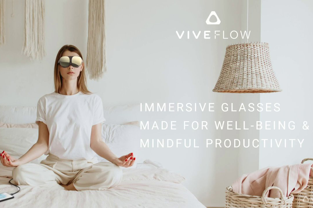 Peson meditating in bed while wearing HTC Vive Flow standalone VR headset.