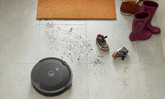 iRobot Roomba 694 Robot Vacuum cleaning a foyer.