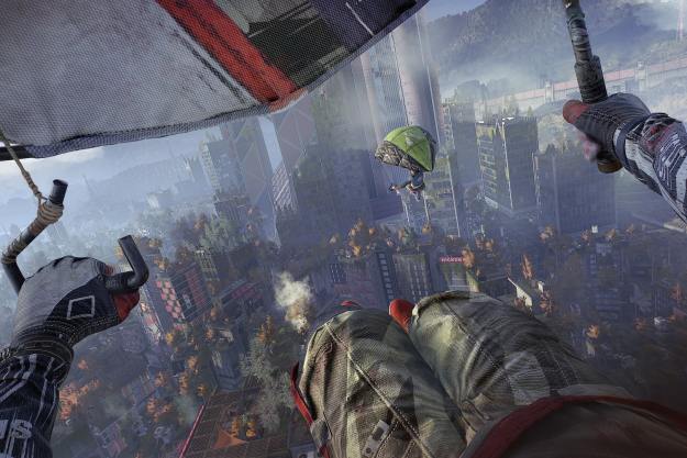 Players using the paraglider in Dying Light 2.