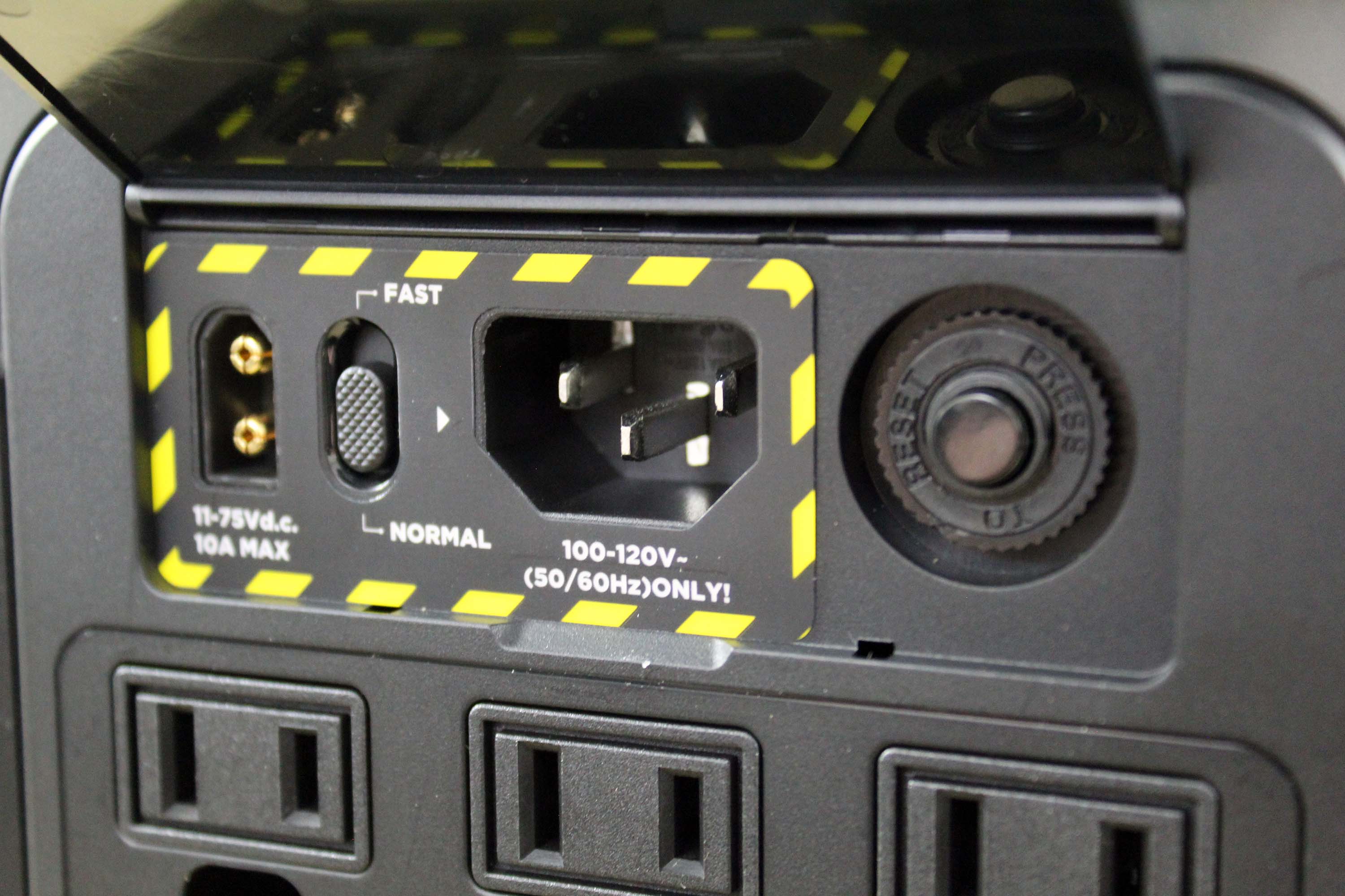 The EcoFlow Delta Mini has several power input ports hidden behind a panel.