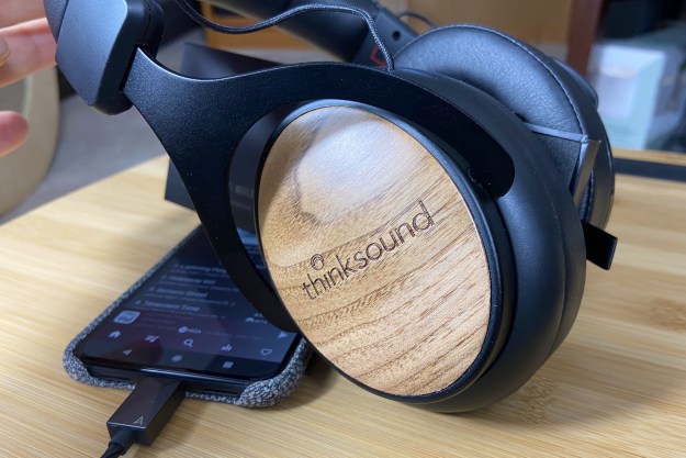 Close-up of Thinksound OV21 wired headphones' walnut cover.