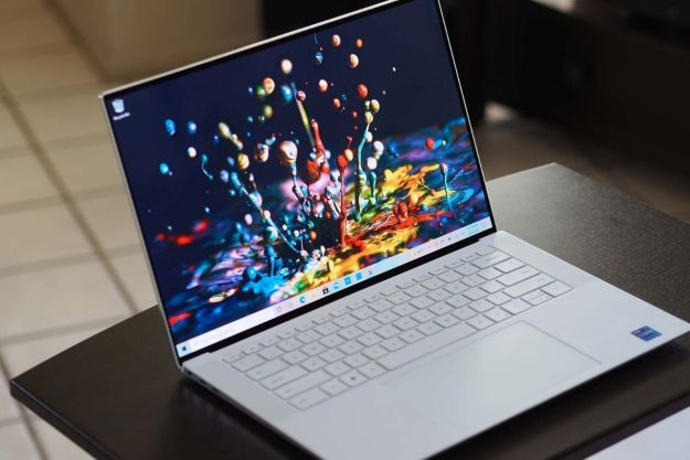 Dell XPS 15 OLED on a table.