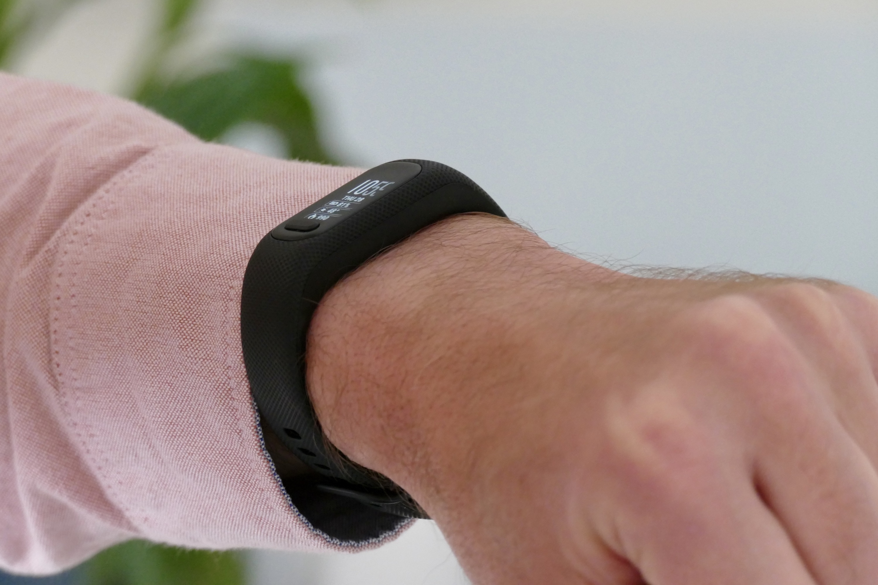 Garmin Vivosmart 5 on a man's wrist, seen from the side.