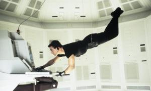 Tom Cruise stars in Mission: Impossible (1996).