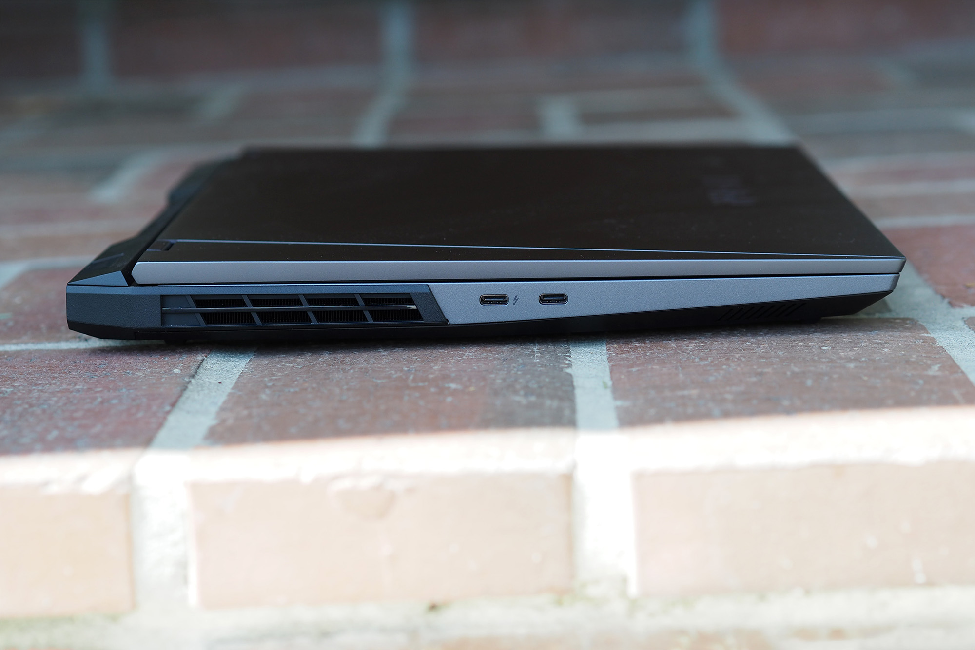 The left-hand side of the Lenovo Legion 5i Pro features a lightning USB-C port and another USB-C port.