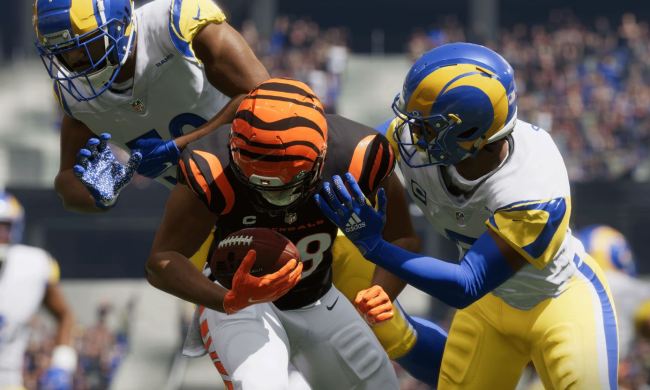 Joe Burrow gets tackled by Chargers players in Madden NFL 23.