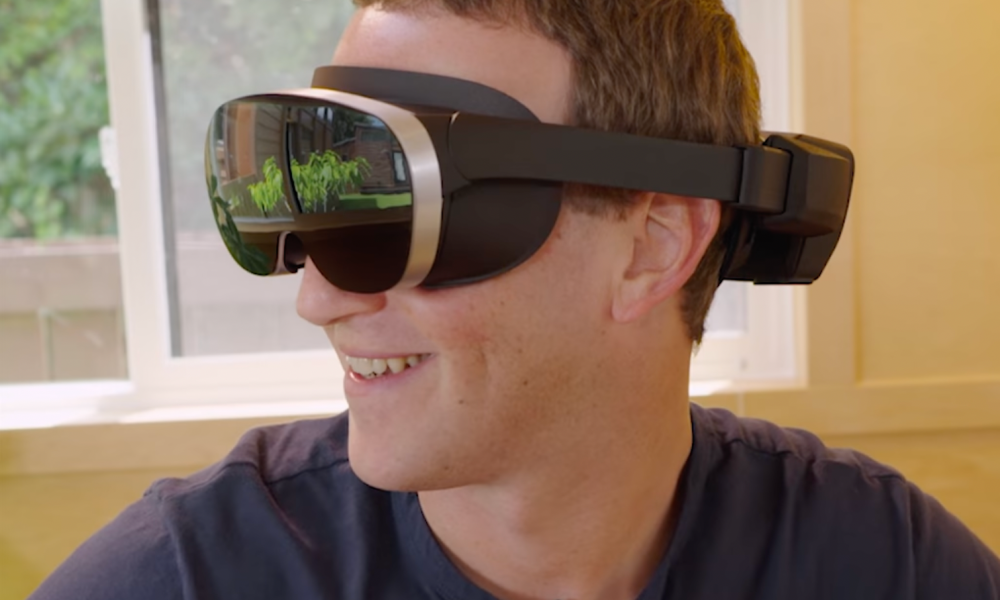 Mark Zuckerberg wearing a prototype VR headset.