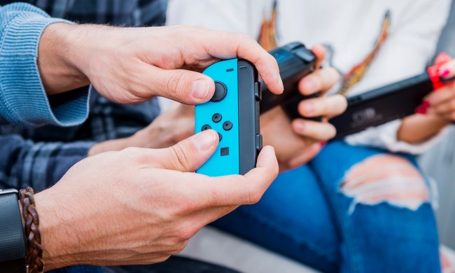 Two players play Nintendo Switch.