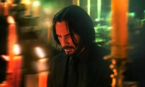 John Wick sits at an altar in "John Wick: Chapter 4."