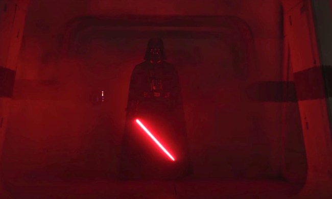Darth Vader igniting his lightsaber and lighting the hall red in Rogue One.